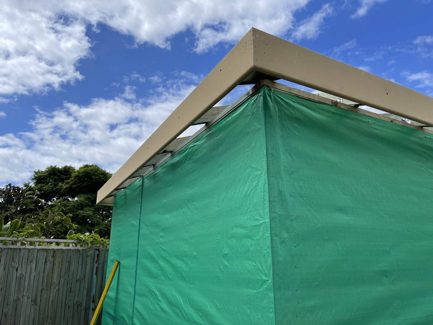 Clean fascia corner alignment where the garage skillion roofline meets, set true against the sky, Ashfield carpentry by Loel Homes