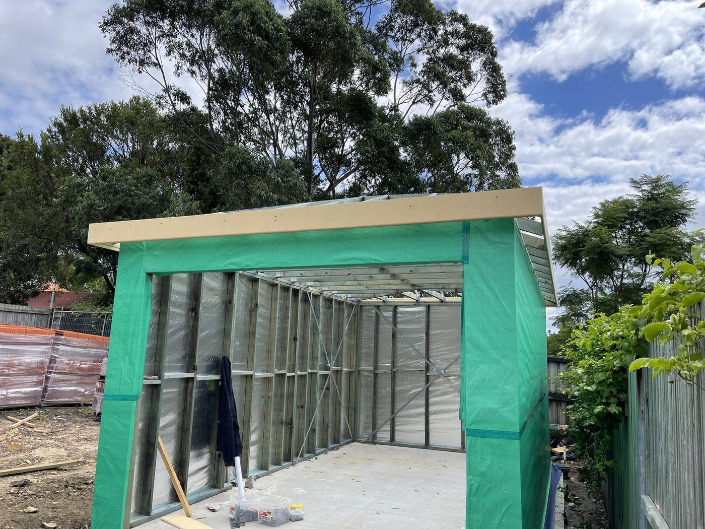 Inside the wrapped garage looking to the fascia and eave line along the skillion roof, Ashfield carpentry by Loel Homes
