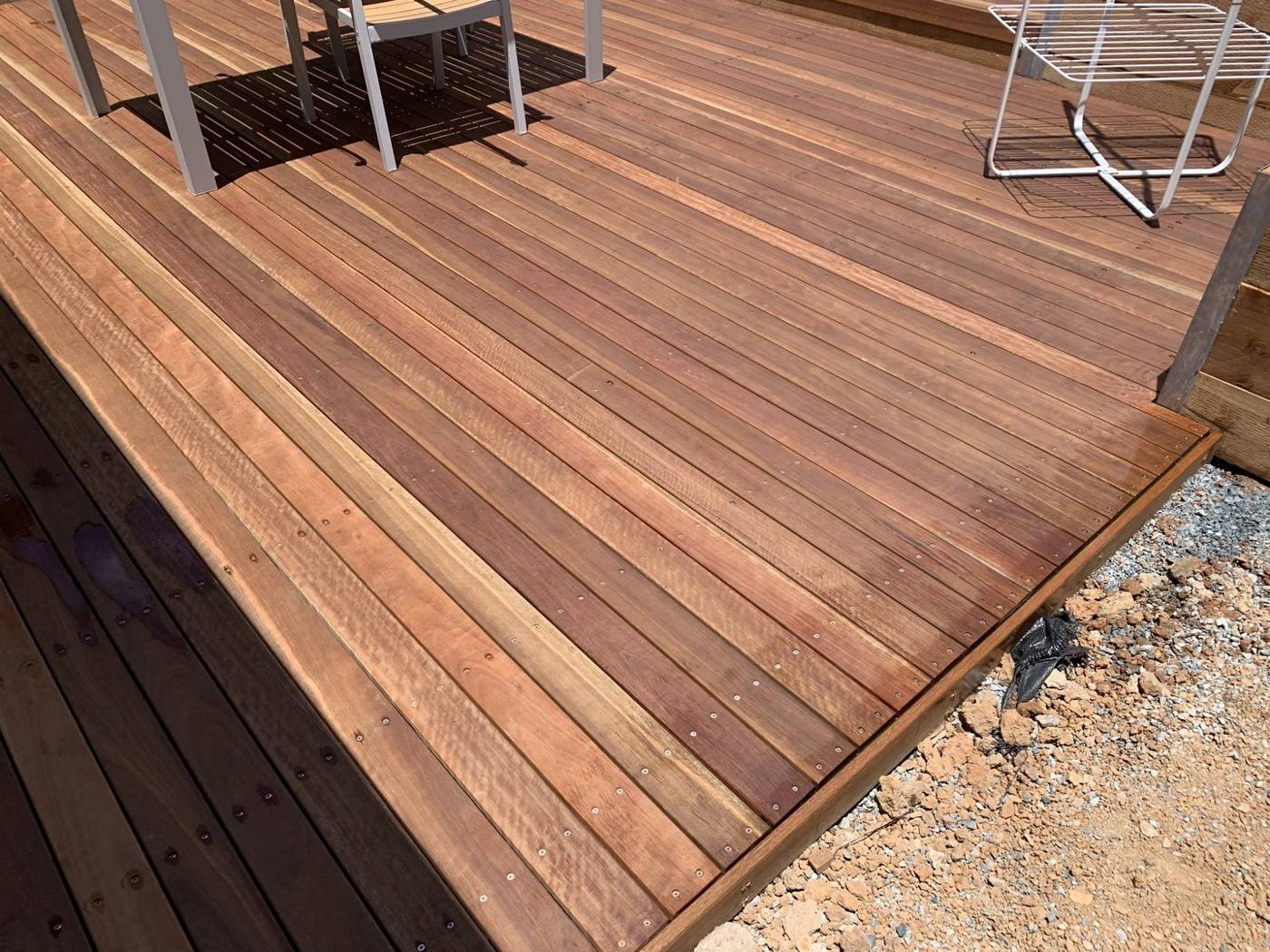 Finished raised hardwood deck with timber steps down to the landscaped yard, Dulwich Hill by Loel Homes