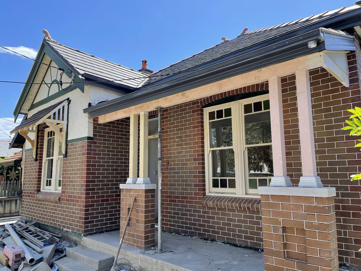 Rebuilt verandah brick piers with rendered columns and cast cement caps, Inner West restoration by Loel Homes