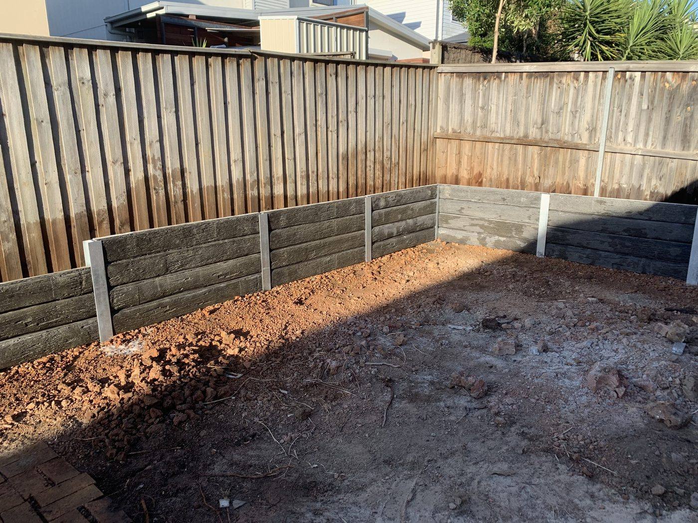 Retaining walls complete with site graded ready for excavation by Loel Homes