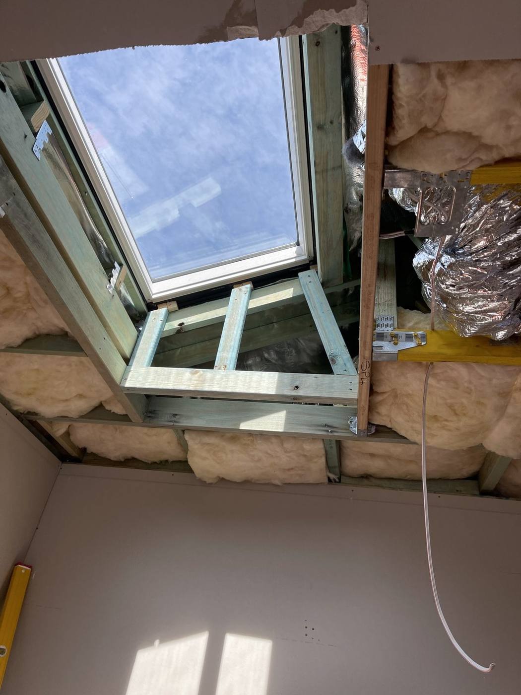 Skylight shaft framed through the insulated ceiling ready for lining, heritage terrace carpentry by Loel Homes