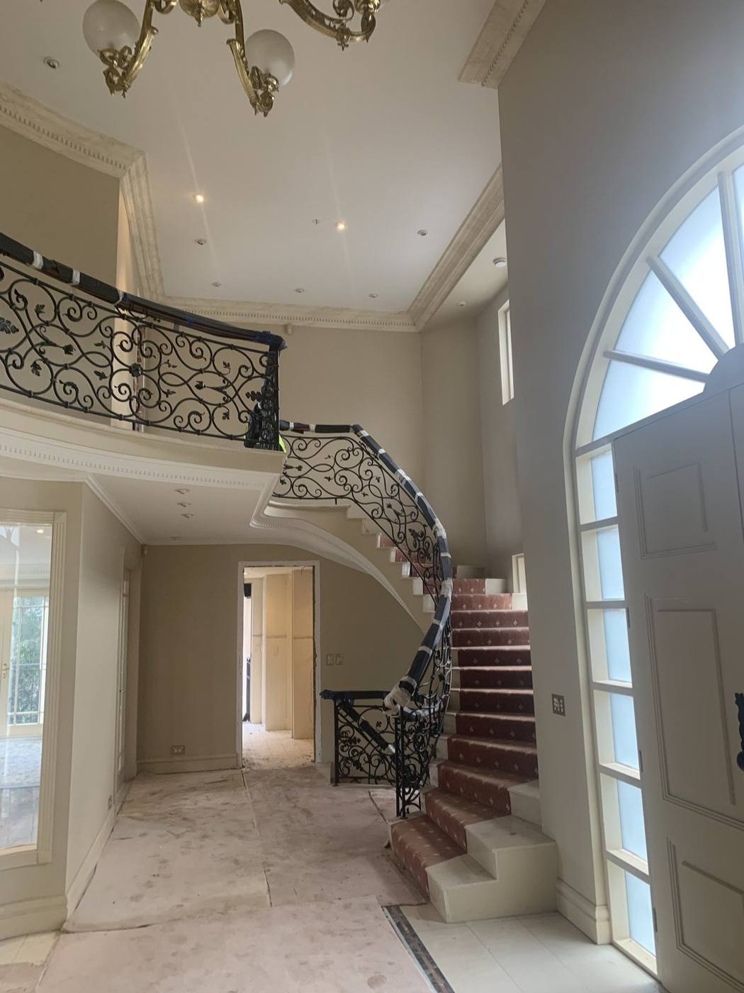 Sweeping staircase in a light-filled void, Vaucluse by Loel Homes
